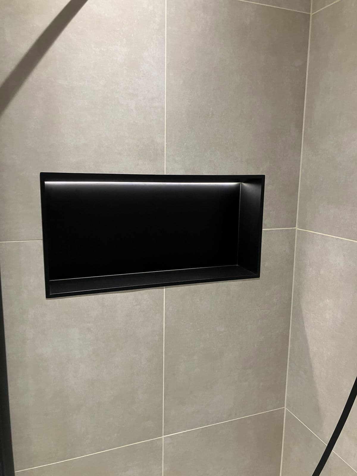Completed bathroom renovation - wall-hung vanity unit with mirror