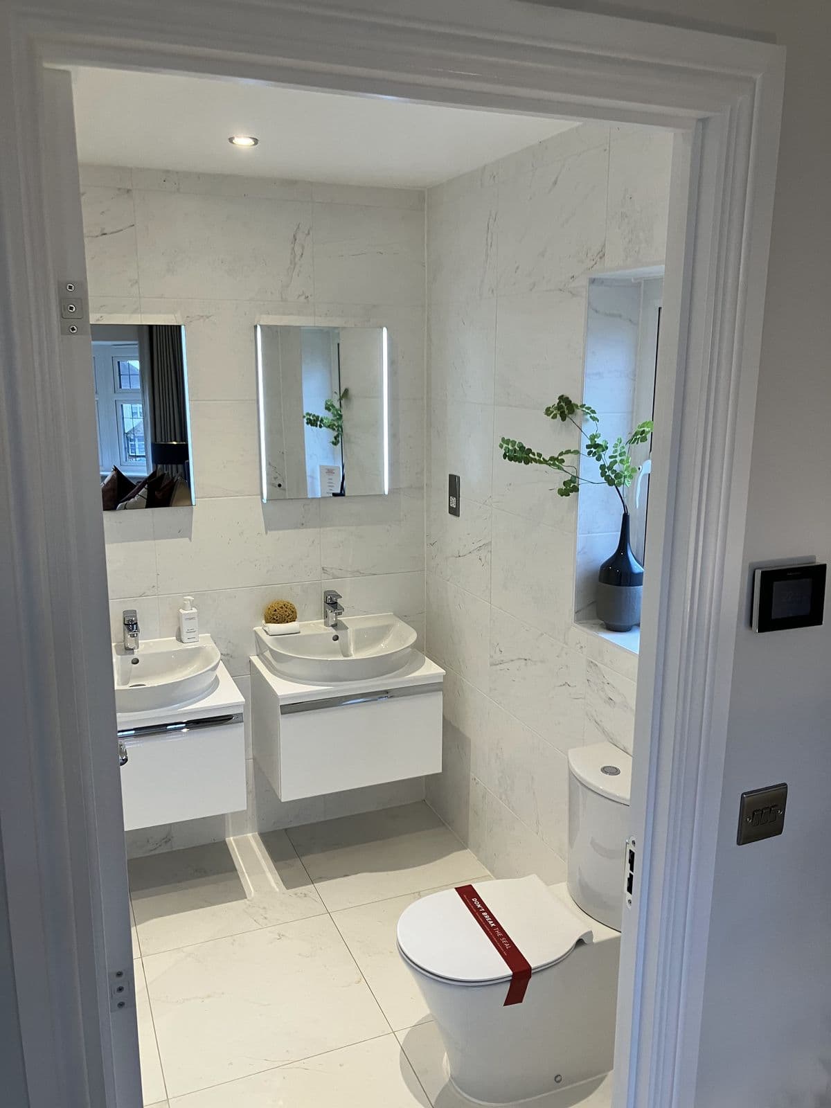 Completed bathroom renovation - en-suite layout with shower and basin