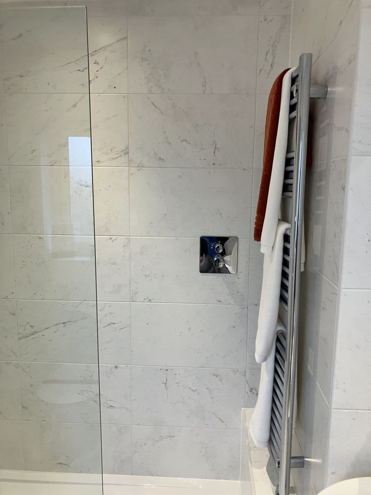 Completed bathroom renovation - corner shower enclosure