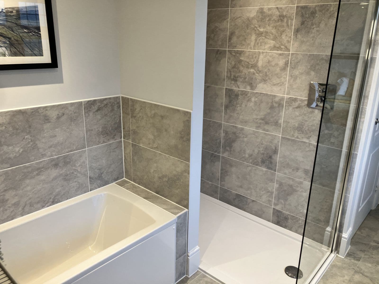 Recent Maycor bathroom project - heated towel rail and tiled wall