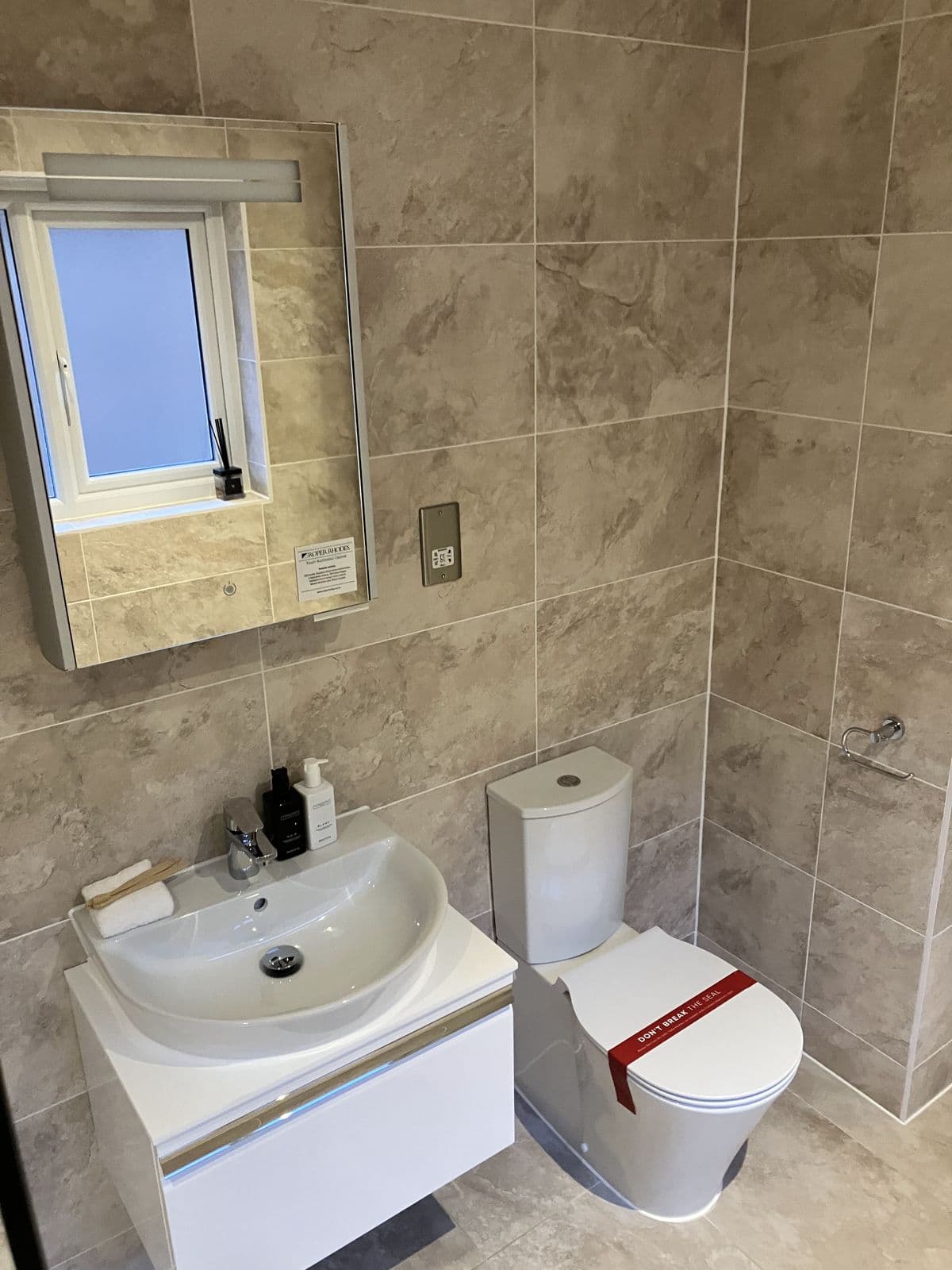 Recent Maycor bathroom project - feature tiling and lighting detail