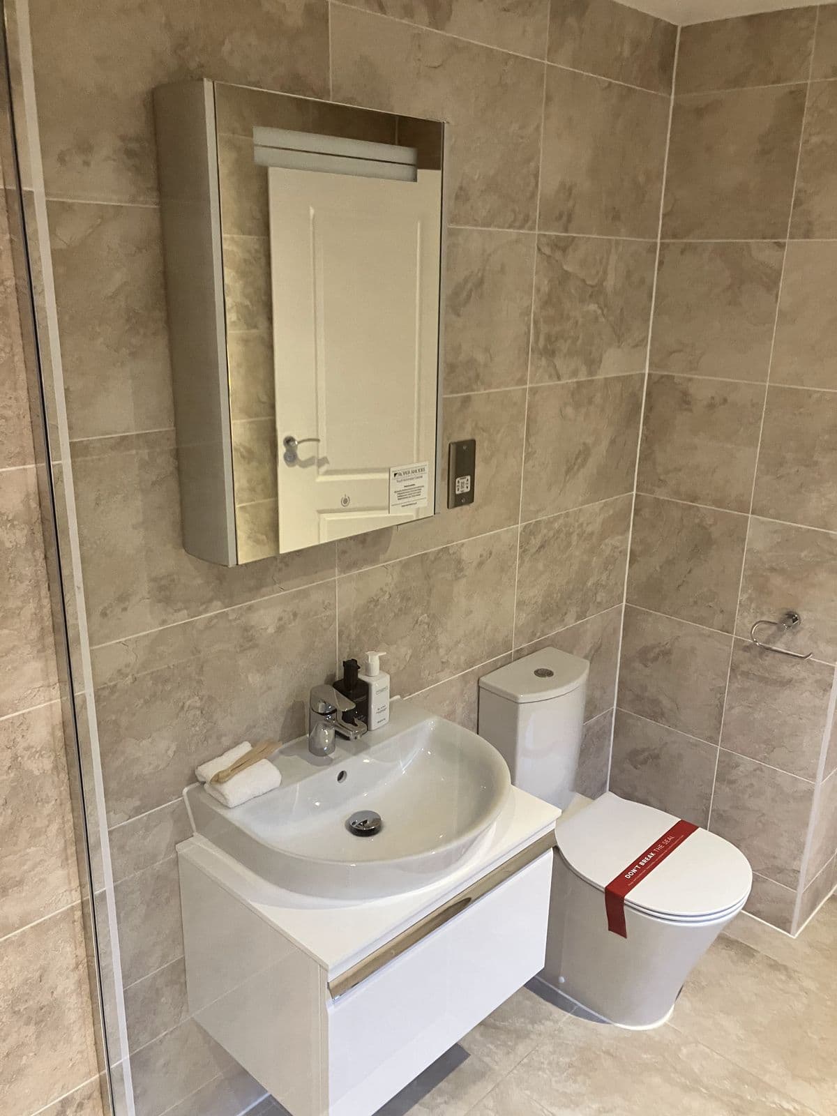 Recent Maycor bathroom project - bath panel and tiled surround