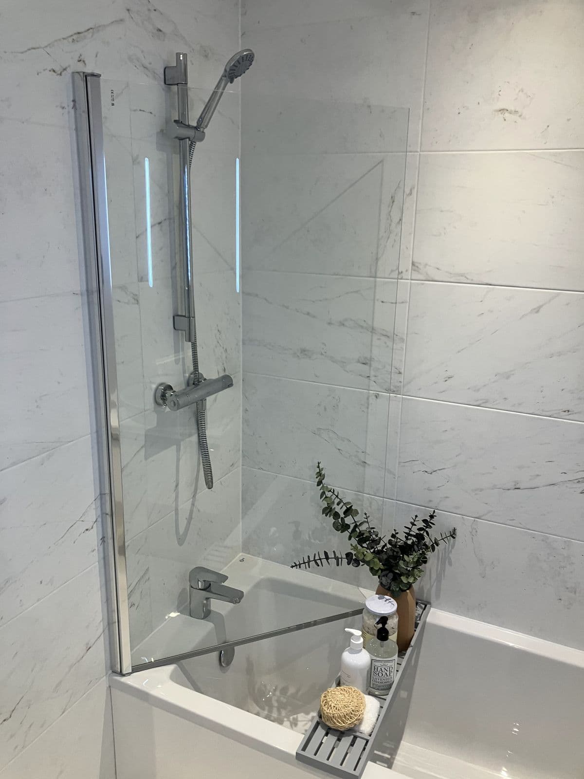 Recent Maycor bathroom project - tiled splashback and chrome fittings