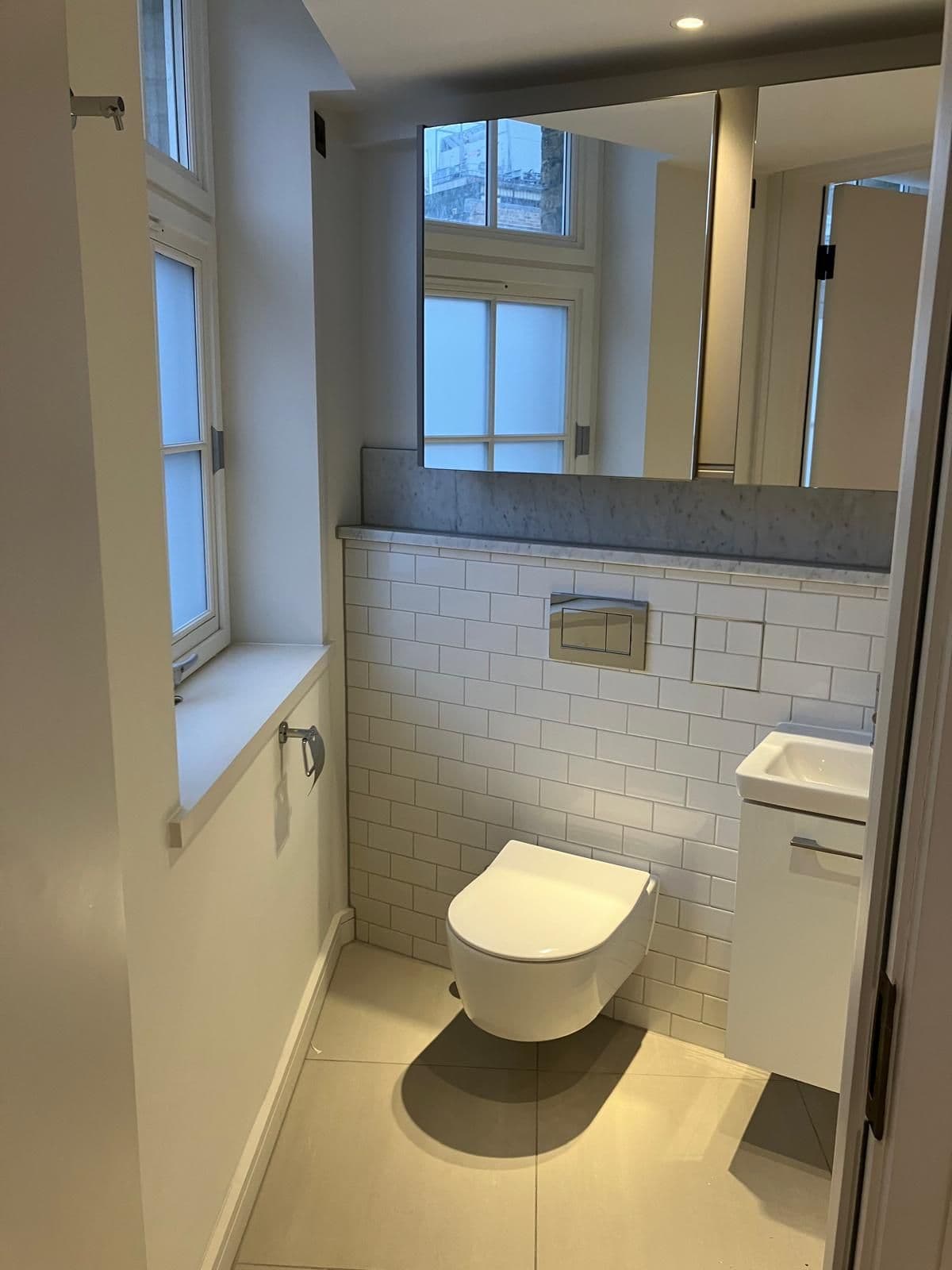 London bathroom refurbishment - freestanding bathtub and tiled surround