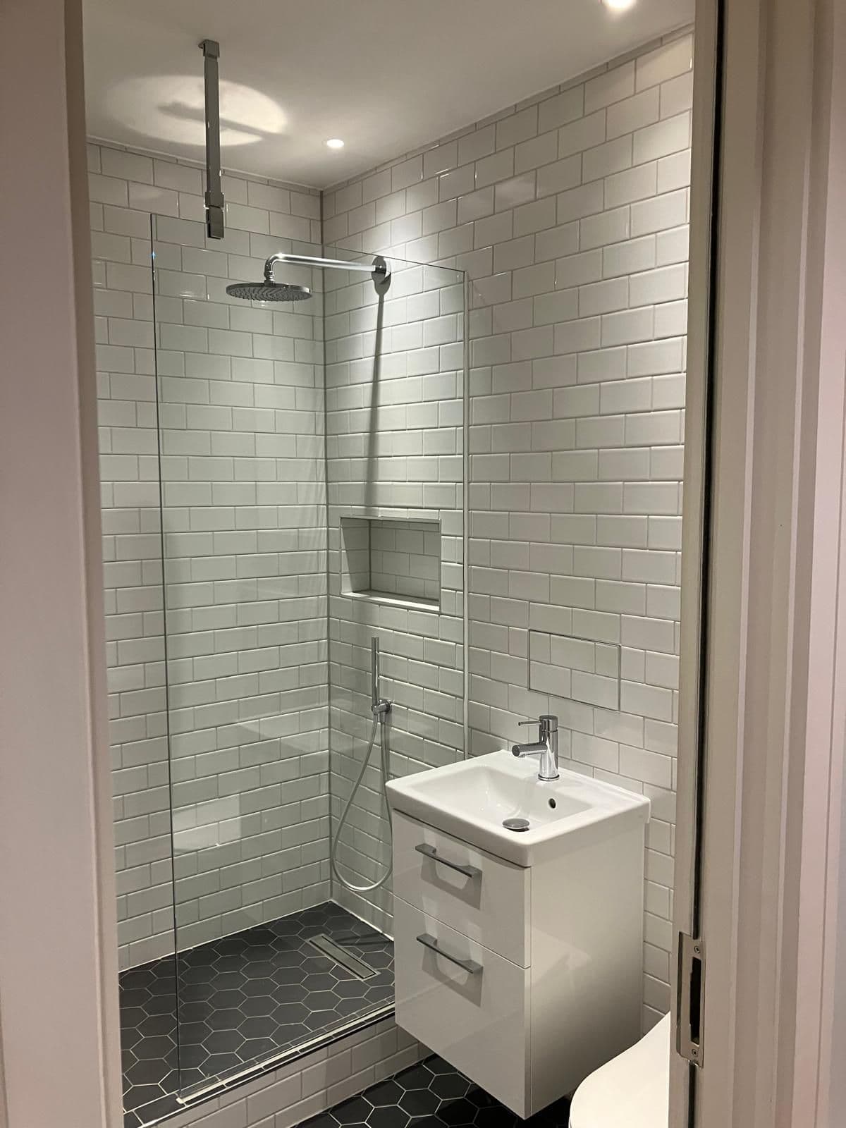 London bathroom refurbishment - mirrored bathroom storage cabinet