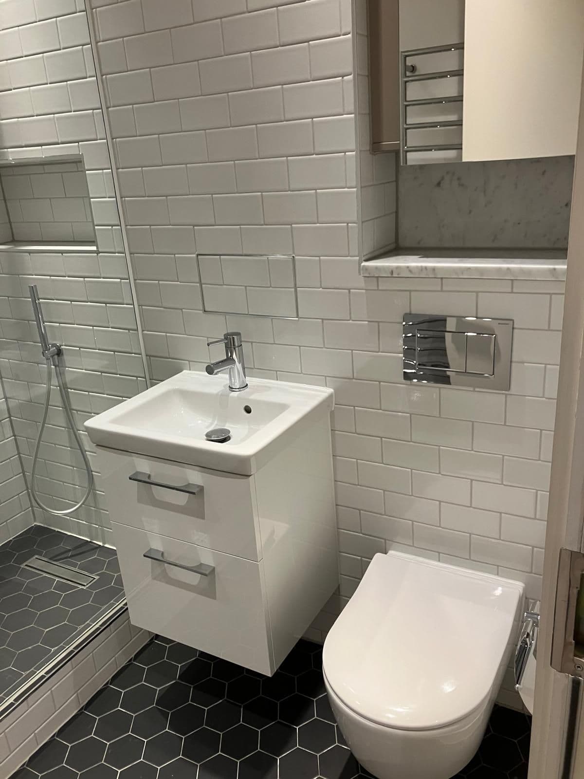 London bathroom refurbishment - bath panel and tiled surround