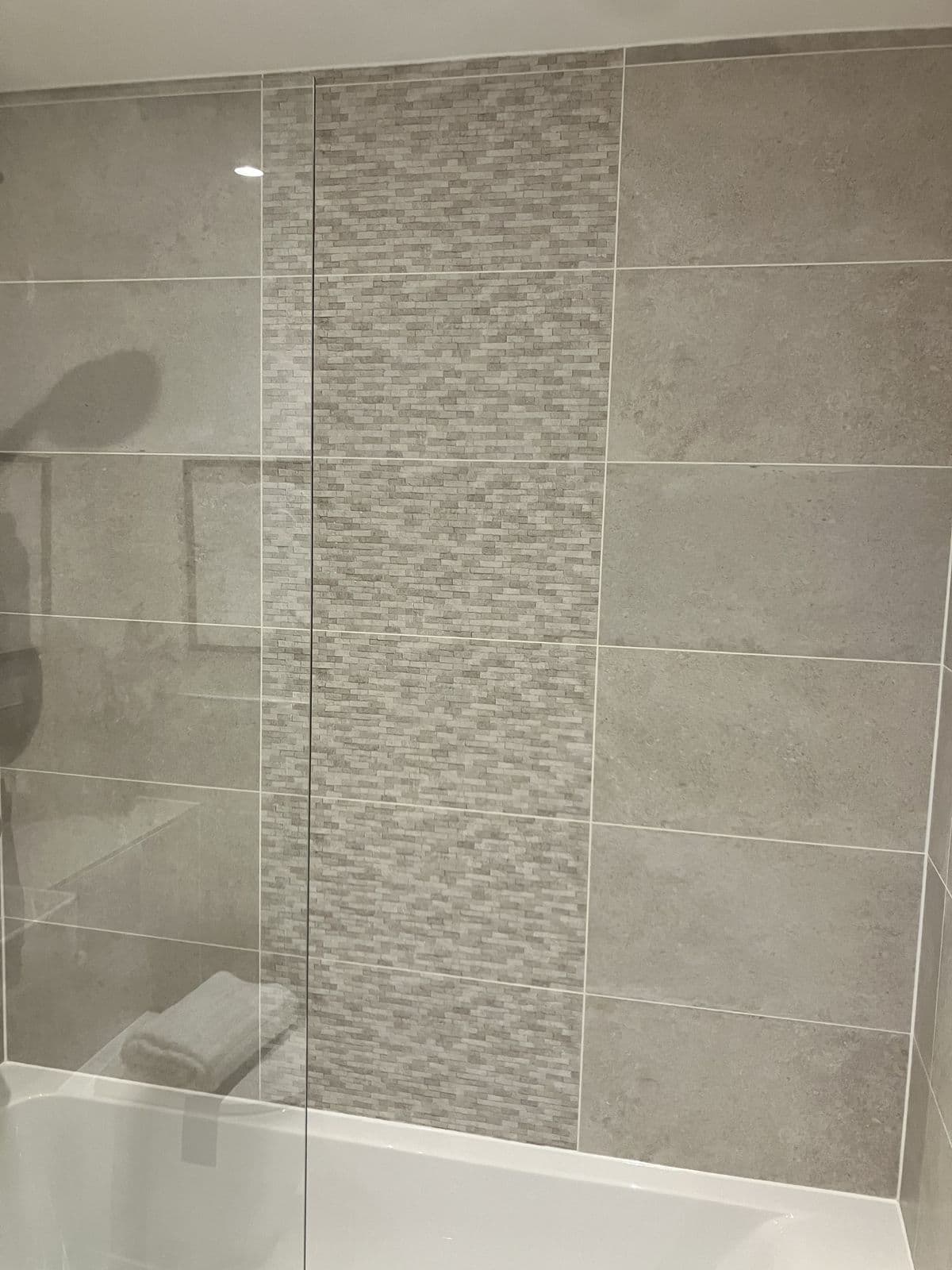 Bathroom renovation detail - mirrored bathroom storage cabinet