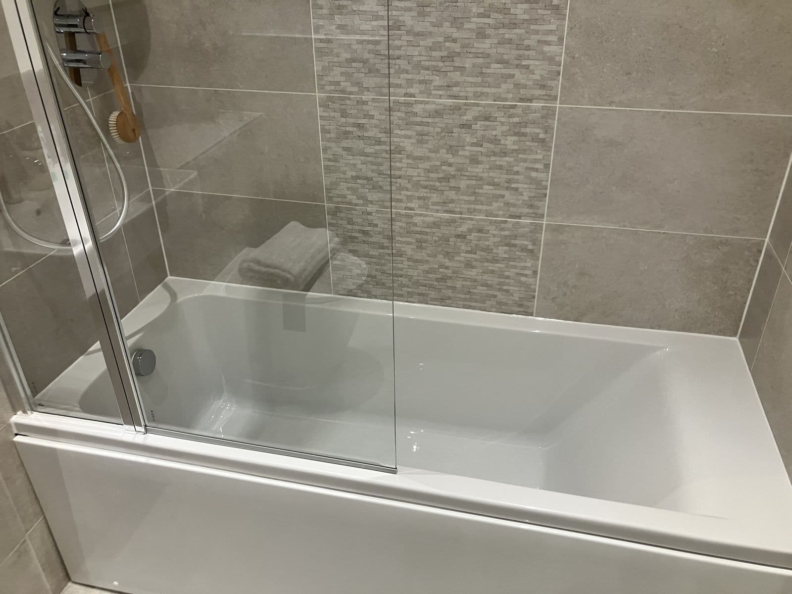 Bathroom renovation detail - feature tiling and lighting detail