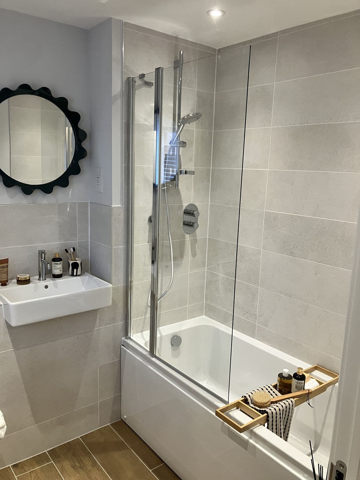 Bathroom renovation detail - bath panel and tiled surround