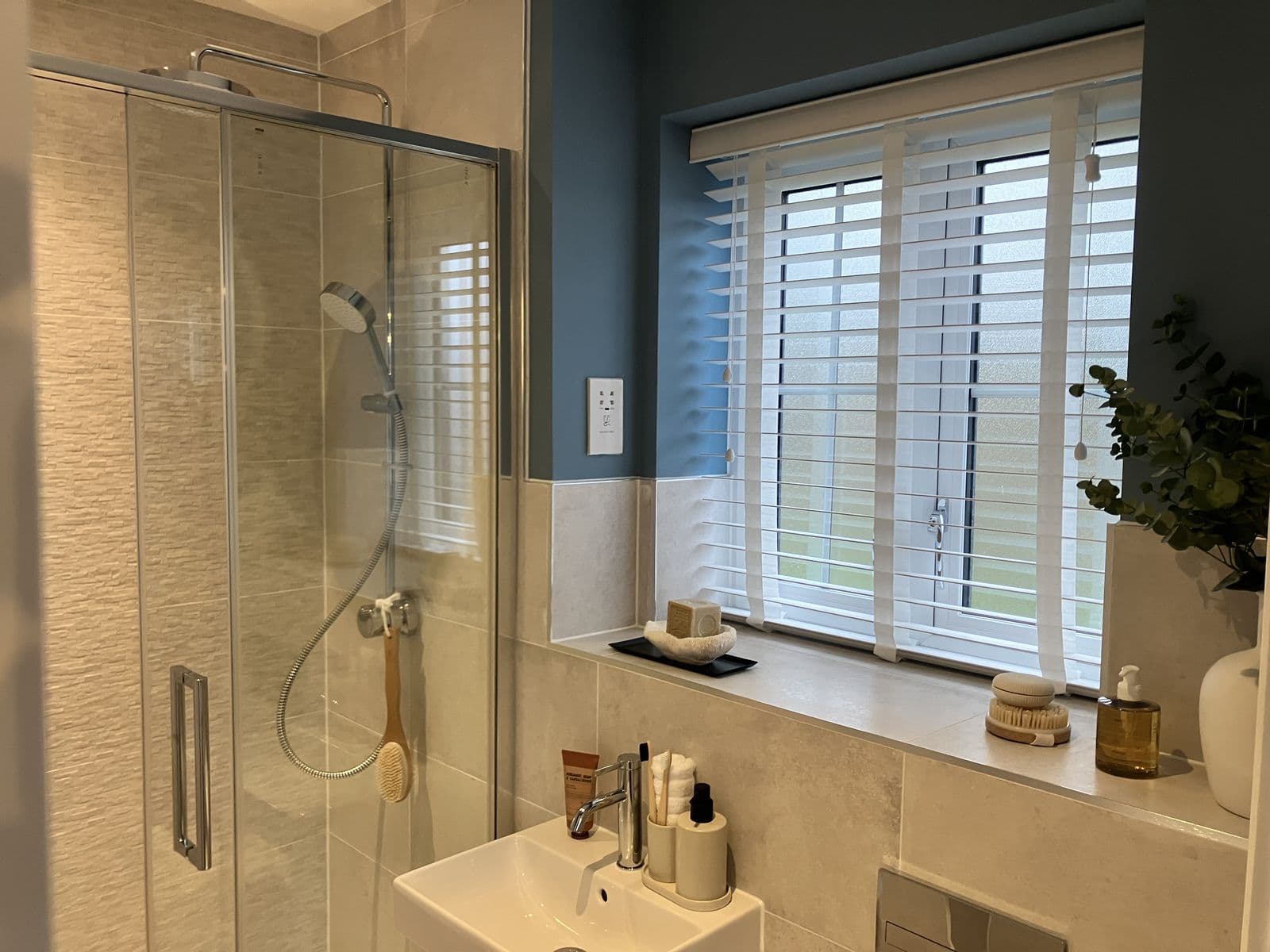Bathroom renovation detail - curved shower screen and mirror