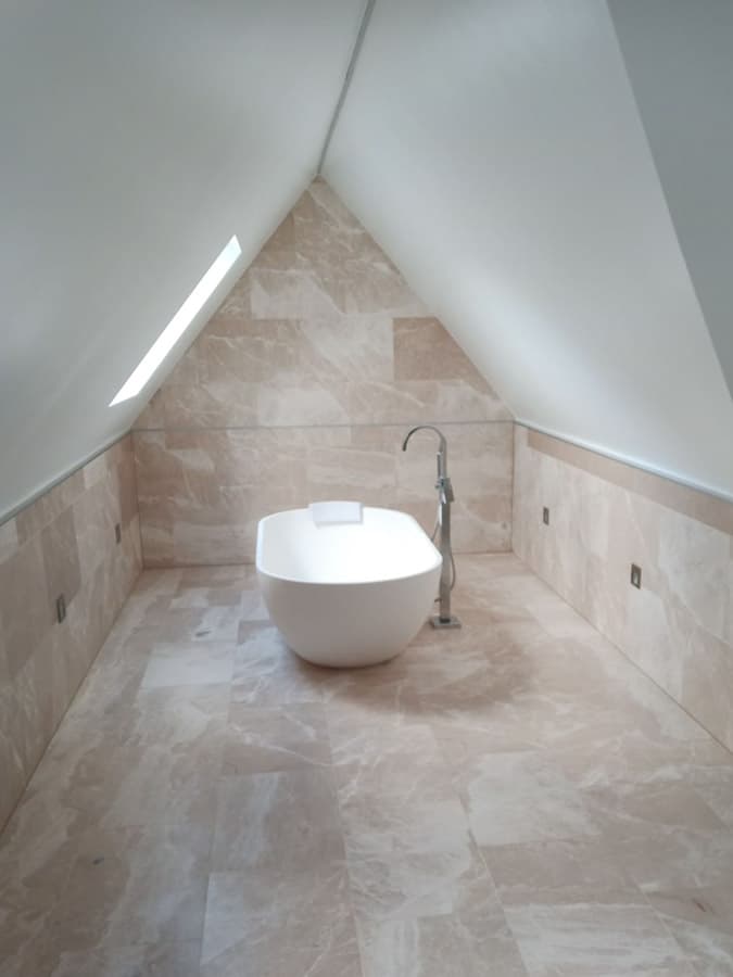 Freestanding bath in a loft bathroom